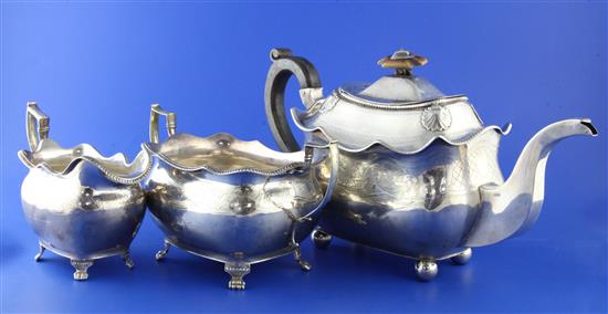 A matched George III Irish silver three piece tea set, gross 34.5 oz.